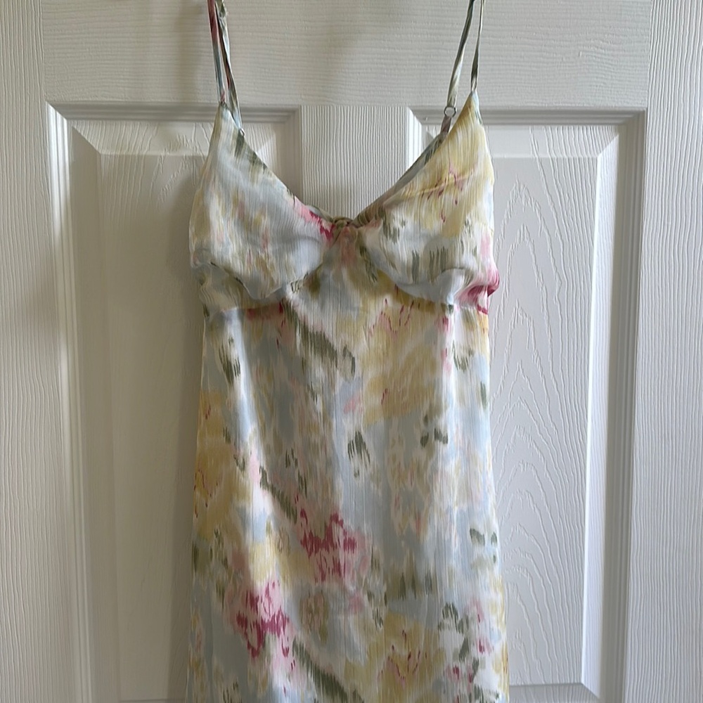 Boutique midi dress. Pastel multicolor with open back. Size medium.
